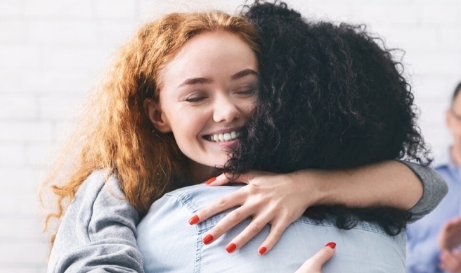 two women hugging